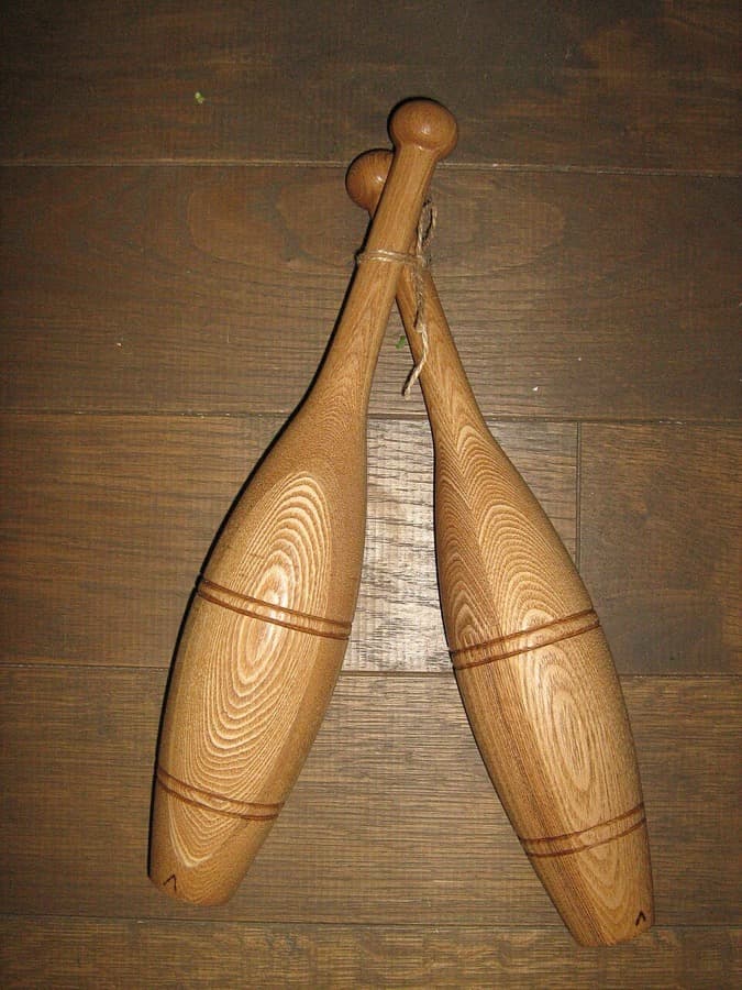A pair of wooden Indian clubs