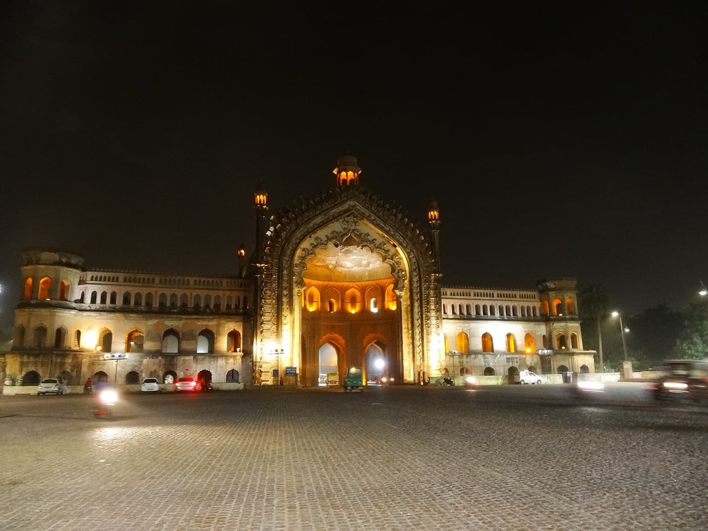 Rumi Darwaza in Lucknow at night, lit in orange